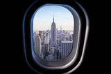 New York city view from plane window. View from a jet plane window high in the sky