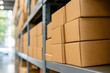 © Studio - Cardboard boxes stacked on metal shelves in modern warehouse, organized logistics distribution center, close-up view of package delivery and storage concept.
