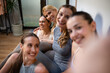 © Zoran Jesic - Diverse women friends smiling doing selfie after workout