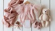 © Generative AI - Charming Newborn Baby Girl Clothes and Accessories Flat Lay Setup, Soft Pink Tones, Ideal for Photography and Maternity Themes