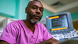 © Natallia - Experienced male doctor using ultrasound diagnostic equipment in a modern hospital clinic