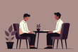 © MS - Business interview or personal therapy session with two men sitting at table in serious calm conversation.