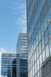© Dirk - Brussels, Belgium. Modern glass office buildings with layered perspective and reflections of telecommunications tower
