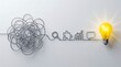 © Samudra_png - Tangled wire straightening into business analytics icons and ending at a glowing yellow lightbulb symbolizing business strategy and creative problem solving.