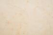 © Kwangmoozaa - Old vintage paper texture background with aged stains and antique yellowed parchment effect