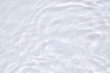 © Kwangmoozaa - Abstract white transparent water shadow surface texture natural ripple background
