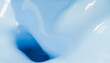© Connect Images - Close-up of swirling blue liquid creating abstract shapes and dynamic flow.