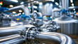 © Denis Yevtekhov - Stainless steel food production equipment with pipes, tanks and measuring instruments captured in documentary stock photography style with clear technical composition, emphasizing