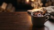 © Таня Андреева - Steaming cup of mulled wine on wooden table with cozy fireplace background.