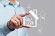 © wcbxyz  - Businessman pointing at real estate mortgage interest rate growth graphic