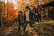 © Carlos - Golden autumn light bathes a joyful family outdoors