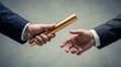 © image and icon - Closeup of a business person passing a golden relay baton to another person