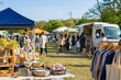 © Japan Local Events - Sunny outdoor community market with vendor tents and food truck
