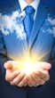 © tian - A person in a suit holds up cupped hands with bright light radiating, surrounded by clouds