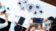 © InfiniteFlow - A diverse group of professionals collaborates on data analytics in a modern office setting, utilizing technology and visuals to drive insights and strategy development. Raster