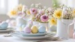 © Sinechana - 65.Refined Easter table decor with delicate flowers, pastel eggs and simple tableware, balanced layout, light background, natural springtime elegance