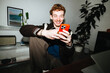 © Julia - The phone becomes part of his work routine in a relaxed home office.