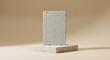 © MstFarjana - Minimalist display platform made of cimento queimado featuring two raw concrete blocks on a soft beige background for elegant product photography staging
