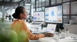 © Andrey Popov - Young Financial Analyst Reviewing Key Business Data