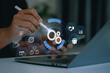 © THAWEERAT - Businessman developing digital automation system and AI workflow optimization, Concept of process management, operational efficiency, automation business technology, digital transformation strategy.