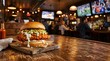 © Giulia - Buffalo chicken sandwich served on a wooden board in a blurred pub bar
