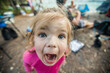 © Cavan Images - Funny close up of a young girl shouting with excitement