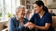 © Ievgeniia - Smiling caregiver in scrub top holds hands with laughing elderly woman in cozy care home lounge; other seniors sit chatting in soft daylight by window
