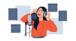© Adrian - Talented young woman singing into a professional condenser microphone while wearing headphones in a recording studio with acoustic foam panels.