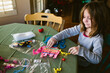 © Natalie Wheeler - Girl doing arts and crafts