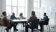 © AimanRahim - Diverse business professionals in a meeting discussing legal strategy and intellectual property in an office setting.
