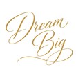© Puput - Dream Big gold calligraphy script lettering isolated on white background.