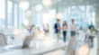 © Celt Studio - Defocused business office background showing professional teamwork collaboration modern workplace environment bright soft indoor lighting corporate company interior abstract bokeh