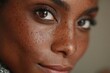 © Oleksandr - Close-up portrait of brown-skinned woman with natural skin blemishes and dark spots