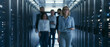 © olga - A team of professionals walking through a modern data center, surrounded by rows of servers. The focus is on a woman in the foreground, holding a tablet, as the team moves forward with purpose
