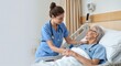 © Nuttamon - Young nurse taking care of senior patient in hospital room representing healthcare � Healthcare and Wellness Concept for Medical and Health Insurance Content