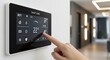 © Riesa - Smart home control panel with touch screen, finger interacting with thermostat interface, modern hallway background