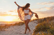 © kayden - stylish attractive slim smiling woman on beach in summer style fashion trend outfit