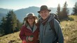© demzp - Happy senior couple enjoying a scenic mountain hike together on a sunny day