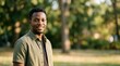 © Dira - Smiling young african american man in a sunny park portrait