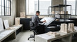 © Celt Studio - Professional male architect drawing architectural plans using large digital display screen inside creative bright studio surrounded by classic stone building models