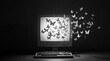 © Absham Shahid - Digital transformation concept with butterflies flying out of a computer