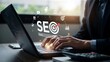 © Siam - Digital seo search engine optimization marketing concept showing hands typing on laptop keyboard with target icon and social media graphics representing web ranking and online visibility strategies.