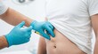 © INSPIRIA.K - Doctor injecting medication into belly of man for weight loss treatment. Healthcare therapy for obesity and health management concept.
