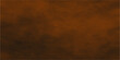 © mehek - Earthy brown textured background with subtle dark cloud-like formations and soft gradient lighting evokes a sense of depth and warmth.