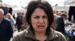 © Guilherme - Disgusted woman making repulsed face at street market