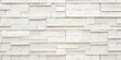 © Design Infinity - arctic white split face ledger stone wall texture background surface