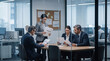 © starush - Glass Office Breach Review Seen Through Partition During Corporate Crisis