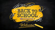 © Yudooo - Creative Back to School Welcome Banner with Yellow Paint Stroke and Pencil on Black Chalkboard Background