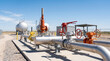 © Cliff - Industrial gas distribution station with valves and safety mechanisms in bright sunlight