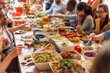 © Rawpixel.com - Diverse group enjoying communal feast